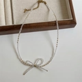 Detailed view of faceted crystal beaded necklace with elegant bow pendant and gold clasp - 3# Transparent White