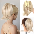 Detailed view of light blonde claw clip ponytail hairpiece with natural wavy texture - Apricot-85H88