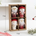 Detail of Christmas felt figurines in a kraft box with size markers 17cm by 11cm - Style K
