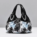 Fashionable bucket handbag with black and white flower pattern in glossy leather finish - Black Dreamy Blue Flower