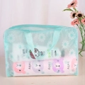 Light blue floral waterproof PVC cosmetic bag with handle and zipper closure - Green