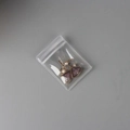 Sacchetto trasparente in PVC per gioielli con orecchini dorati a ventaglio e perle - Sacchetto a chiusura 4*6cm - 26 Seta