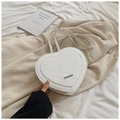 White heart-shaped backpack featuring rich rabbit letter embossing and silver metal plaque - White
