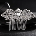 Silver bridal hair comb with symmetrical wing design and shimmering rhinestones - Silver
