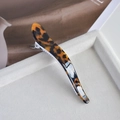 Close-up of amber leopard print hair claw clip on a soft velvet display tray - 2# Dark Tortoiseshell Curved Horn Clip