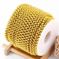 Golden square pearl chain on a white spool for DIY stainless steel jewelry making - Box Chain / 4mm / Gold