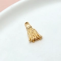 Macro shot of a shiny golden metal tassel pendant for DIY jewelry making on white ceramic - 03# Tassel