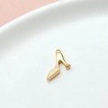 Close-up of golden high heel pendant charm on white ceramic plate for DIY jewelry - 06# High Heels