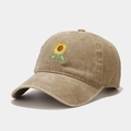 Close-up of vintage washed khaki baseball cap featuring detailed sunflower embroidery - Adjustable / Khaki