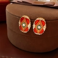 Macro shot of vintage gold earrings with red enamel and pearl in a velvet jewelry box - 925 Sterling Silver Earring Post Drip Oil Pearl Square Stud Earrings