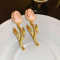 Detailed view of tulip earrings with pink glaze petals and golden leaves on white ceramic - 86# Silver Earring Post Vintage Enamel Rhinestone Pearl Tulip Earrings