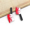 Pair of acrylic bloody cleaver pendants with black handles and red bloodstains - Acrylic Blood Stain Cleaver-16977
