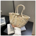 Detail of hand-woven straw bucket bag with cream polka dots and delicate lace bow - Lace Bow Style / Off-white with Color Dots