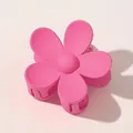 Detail shot of a matte pink flower hair claw clip with a five-petal design and non-slip teeth - Matte Flower Hair Clip - Rose Red