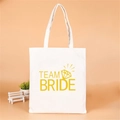 White canvas Team Bride tote bag with gold lettering and diamond graphic for hen parties - Yellow Diamond Team Bride