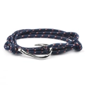 Detail view of navy blue woven nautical bracelet with silver fish hook clasp and red accents - Dark Blue Red White / Silver Hook