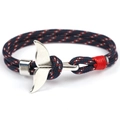 Close-up of nautical woven rope bracelet featuring a polished silver whale tail charm - Whale Tail - Deep Blue