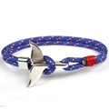 Detail of blue paracord bracelet with silver whale tail clasp and red knot accents - Whale Tail - Blue White Red Striped