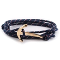 Close-up of blue nylon cord bracelet featuring a gold-plated Viking anchor clasp - GA-12 Blue Rope Red White Detail With Gold Anchor