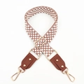 Detail of adjustable embroidered bag strap with polka dots, leather ends and gold buckles - Silver Clasp / Brown