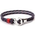 Detail of nautical anchor bracelet with navy 550 paracord weaving and silver metal clasp - Blue Red White Braided