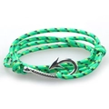 Macro view of green and black woven nautical bracelet with silver fish hook clasp - Green Black