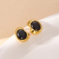 Boucles d'oreilles vintage dorées en forme de haricot avec pierre noire ovale - Boucles d'Oreilles Clous en Ambre Noir