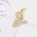 Close-up of a gold-plated V-letter pendant with crown design and zircon stones - Letter V
