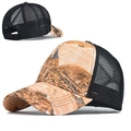 Detail view of leaf camouflage mesh back trucker hat with reinforced brim stitching - Adjustable / Tie-Dye Orange