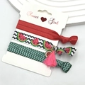 Close-up of three printed elastic hair bands with watermelon pendant and pink tassel decor - Watermelon Slice (3)