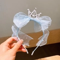 Close-up of light blue mesh headband with crown, bow and star details for girls - Blue