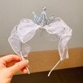 Detailed view of girls princess headband with silver glitter crown and white starry tulle bow - Grayish White
