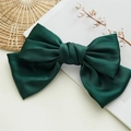 Close-up of deep green satin bow hair clip with spring fastener on white background - Spring Clips / Dark Green