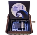 Macro view of hand-cranked wooden music box with Nightmare Before Christmas laser engraving - Halloween B