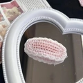 Pink and white knit flower hair clip with scalloped edges on a heart-shaped mirror - 11-Pink Wave