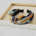 Geknotetes Satin-Stirnband mit Vintage-Gürtel- und Kettenmuster in Marineblau und Orange - Marineblau