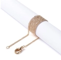 Detailed golden snake chain necklace with lobster clasp wrapped on a white cylinder - 62cm / KC Gold Flattened Chain
