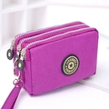 Three-layer purple washed denim wristlet bag with triple zippers and durable strap - Medium / Light Purple
