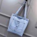 Light blue denim tote bag with external pocket and decorative stitching details - Style 3 Light Blue
