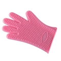 Pink silicone glove with textured surface for pet grooming and heat resistant kitchen use - Pink