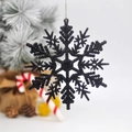 Sparkling black snowflake ornament for Christmas tree decoration with glitter finish - Black