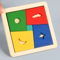 Educational wooden shape puzzle for children featuring red, yellow, blue, and green pieces - Magic Puzzle 5pcs