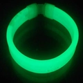 Green glow stick bracelet for parties with secure connector in dark background - Green