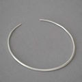 Detailed view of silver minimalist irregular open choker necklace on grey background - Antique Silver
