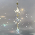 Golden suncatcher crystal wind chime with raw quartz and geometric moon moon pendants - White Crystal / White