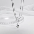 Detail of silver double layer necklace with heart pendant and Love you engraving - Silver