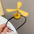 Cerchietto nero divertente con un mulino a vento a libellula in plastica gialla - Cerchietto con Elica / Giallo