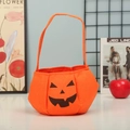 Classic orange felt pumpkin tote bag with Jack-o'-lantern face for Halloween candy - Pumpkin Bag B