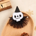 Macro view of Halloween skeleton with wizard hat and mesh gauze hair accessory - Mesh Skull Hat Clip