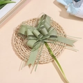 Detailed top view of bean green chiffon bow on a round woven mat for gift decoration - Army Green